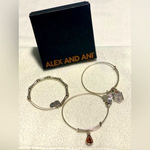 Three Alex and Ani silver bracelets